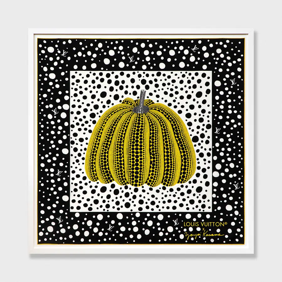 A Louis Vuitton x Yayoi Kusama pumpkin scarf framed in a white frame