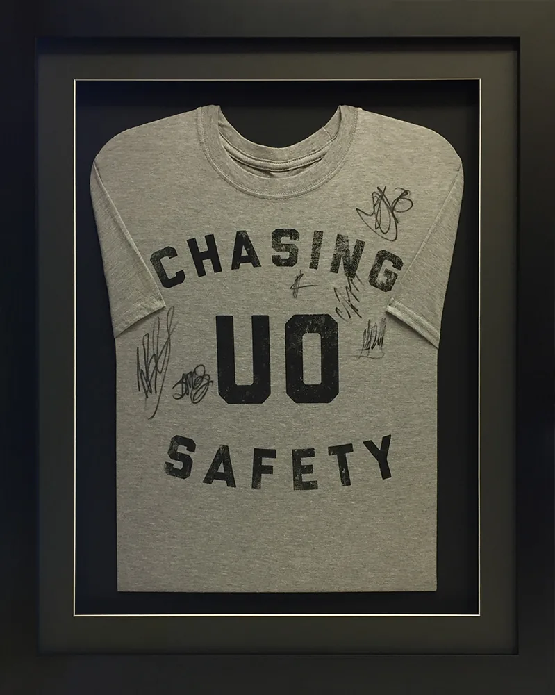 Chasing Safety - Signed T-Shirt, framed by Premier Shirt Framing