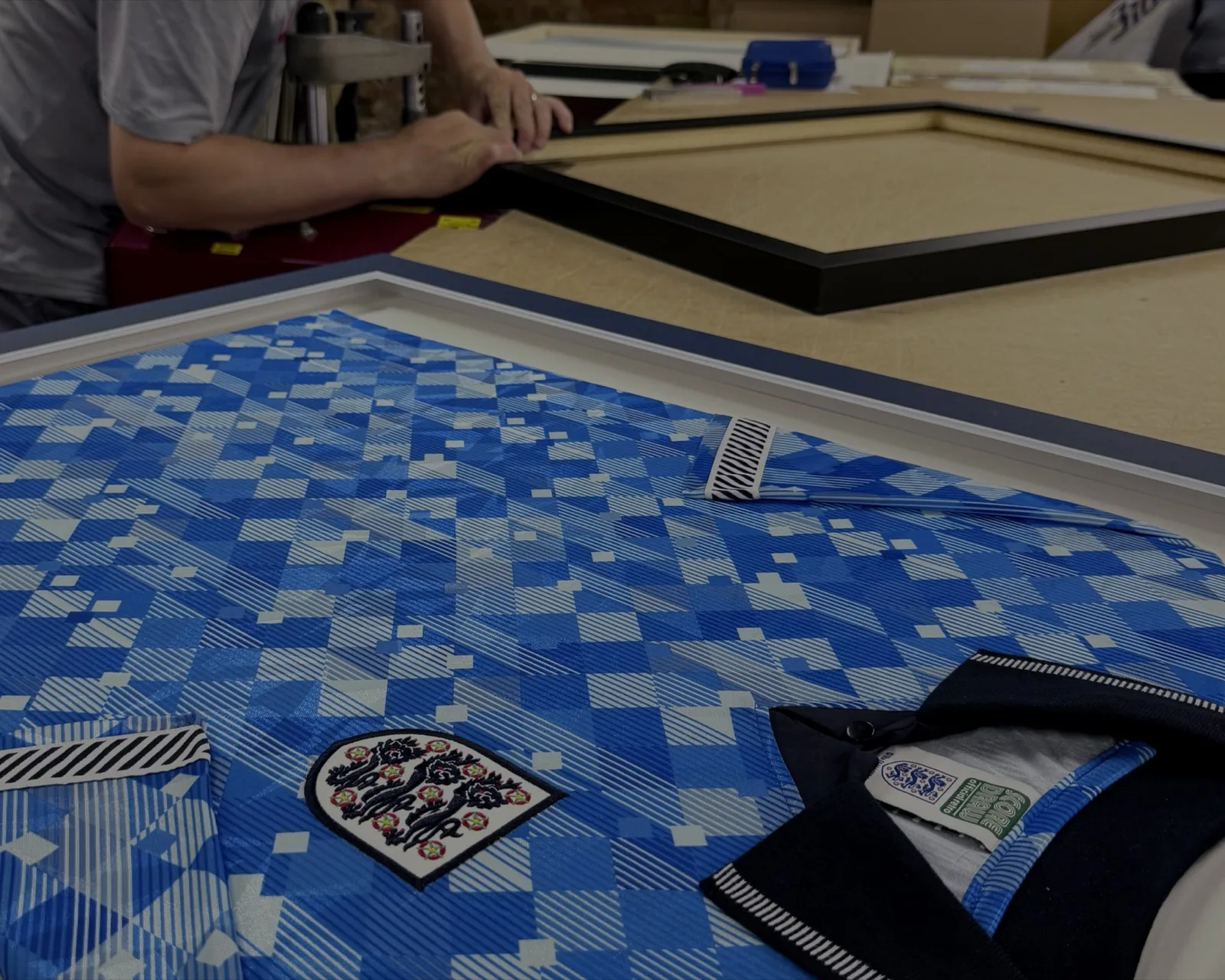 An England shirt laid into its frame while we plan the design