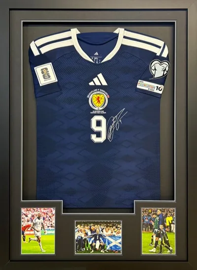 Framed Dykes Scotland football shirt with match images