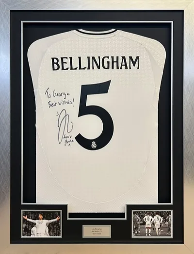 Framed Bellingham Real Madrid football shirt with match images and engraved plaque