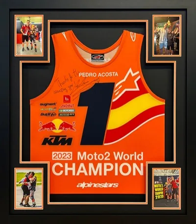 Framed Acosta KTM motorsport memorabilia with images