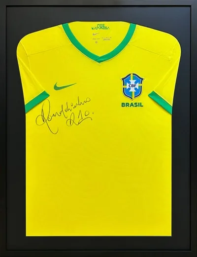 Framed signed Brazil football shirt