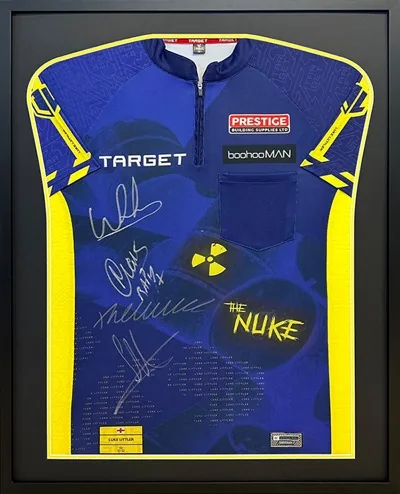 Framed Luke Littler darts memorabilia
